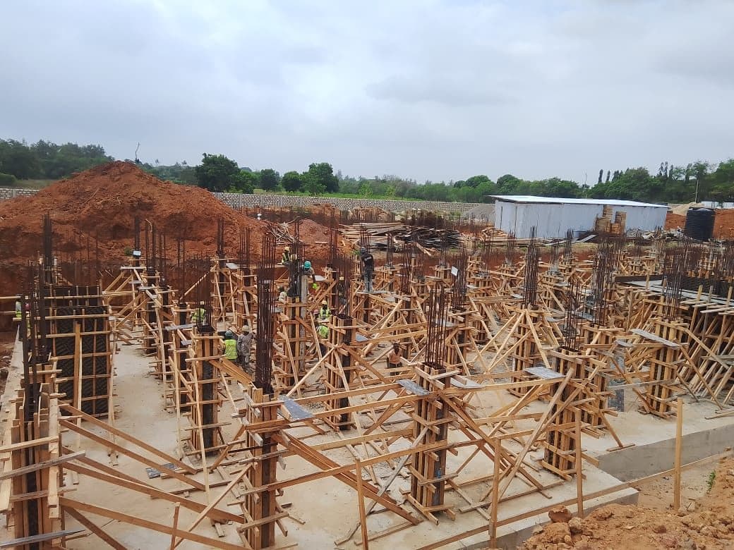 Reinforced concrete columns and formwork on a Prored Builders site